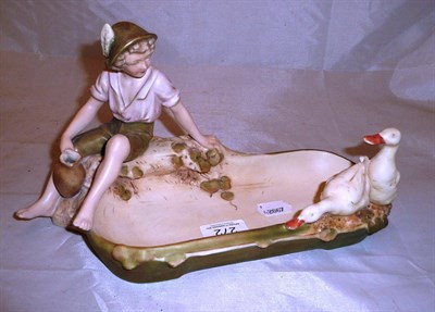 Lot 272 - Royal Dux bowl modelled as a boy with ducks