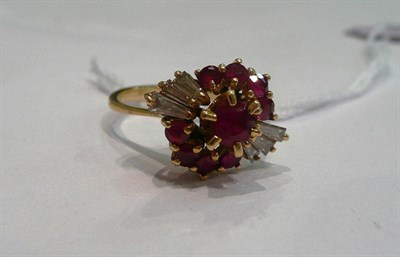 Lot 284 - An 18ct gold ruby and diamond cluster ring