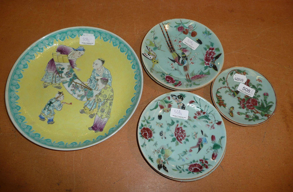 Lot 508 - A Chinese yellow ground dish decorated with enamels with four figures, seal mark to base, also five