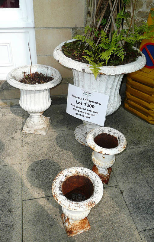 Lot 1309 - Four painted cast iron campana-shaped garden urns