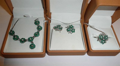 Lot 8 - A pair of emerald cluster earrings, round brilliant cut emeralds and marquise cut and round...
