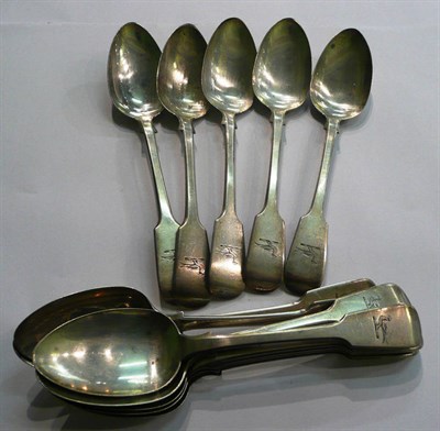 Lot 41 - A set of twelve Irish silver teaspoons with armorial crest, 15oz