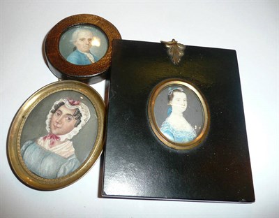 Lot 50 - English school portrait miniature of a lady wearing a lace bonnet circa 1810, ex Austin...