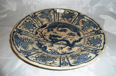 Lot 77 - A Dutch Delft charger decorated in the Oriental manner