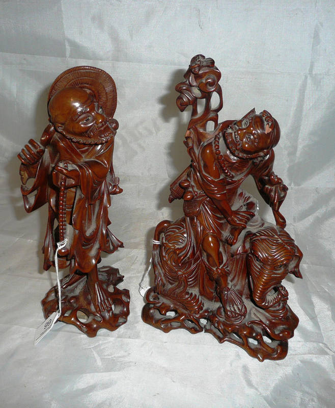 Lot 99 - Two 19th century Chinese hardwood figural carvings