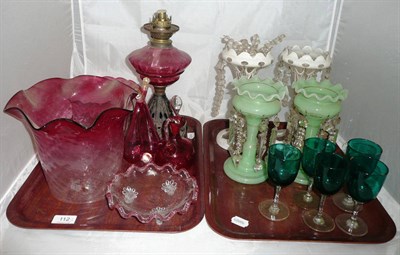 Lot 112 - Two trays including Cranberry oil lamp shades and drop lustres *