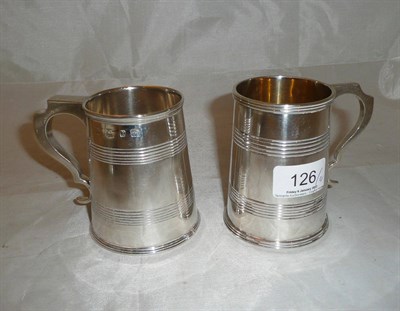 Lot 126 - Two silver mugs with banded decoration