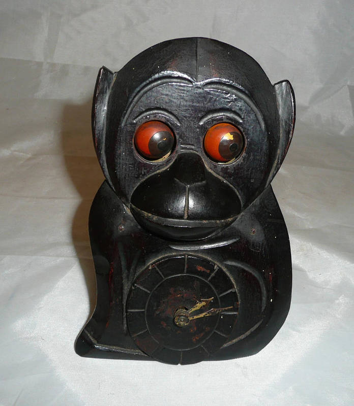 Lot 137 - A novelty clock in the form of a monkey