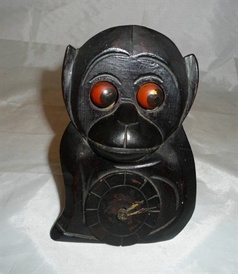 Lot 137 - A novelty clock in the form of a monkey