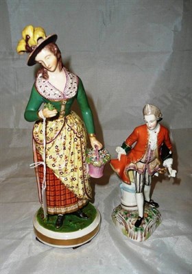 Lot 148 - A Derby porcelain figure of a lady circa 1830, standing holding a basket of flowers (restored)...