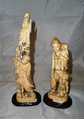 Lot 149 - Two Japanese late Meiji walrus ivory figures and stands