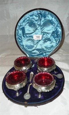 Lot 160 - Boxed set of four salts and spoons, presented June 8th 1882