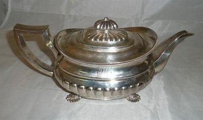 Lot 187 - A George III silver teapot, S Hougham, London 1809