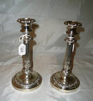 Lot 200 - A pair of George III candlesticks, Matthew Boulton & Plate Co, Birmingham 1818, with detachable...