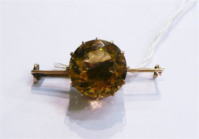 Lot 220 - Gold and citrine brooch