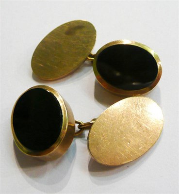 Lot 228 - A pair of 9ct gold onyx set cufflinks