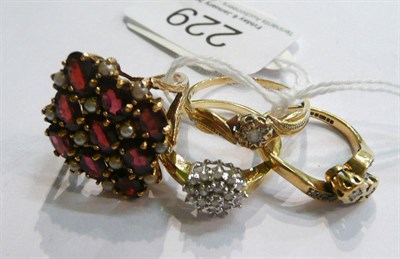 Lot 229 - A 9ct gold garnet and split pearl cluster ring, a 9ct gold diamond cluster ring, a 9ct gold diamond