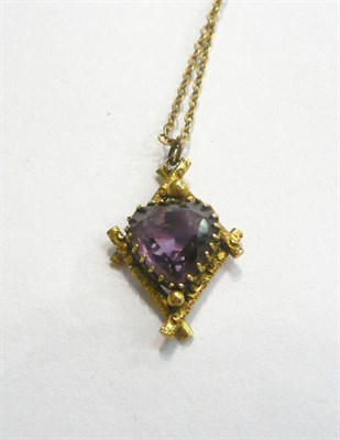 Lot 231 - A 15ct gold and amethyst pendant of heart shape with fine chain  #