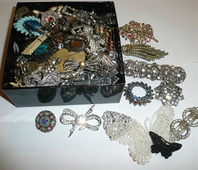 Lot 240 - A quantity of paste set brooches, clips and buckles, costume jewellery, earrings, beads etc