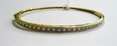 Lot 247 - A diamond bangle