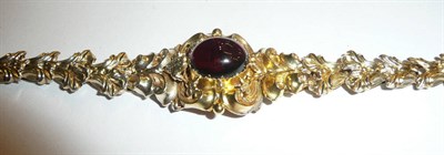 Lot 250 - A carbuncle garnet set bracelet