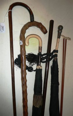 Lot 267 - Three walking sticks, two ivory handled umbrellas and two back scratchers *