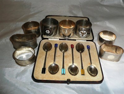 Lot 276 - Six silver napkin rings, pair of Rotary and inner wheel napkin rings and cased set of silver...