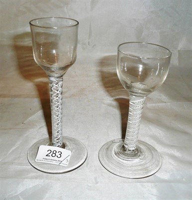 Lot 283 - 18th century wine glass with opaque twist stem together with an 18th century bell shaped wine glass