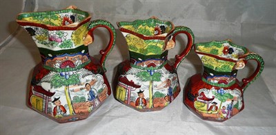 Lot 303 - A set of three 19th century Mason's graduated jugs *