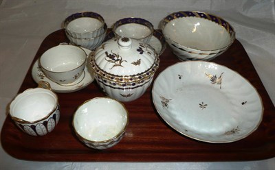 Lot 318 - A tray including Worcester sugar basin and cover, Worcester slop pail, Derby tea bowl, 18th century