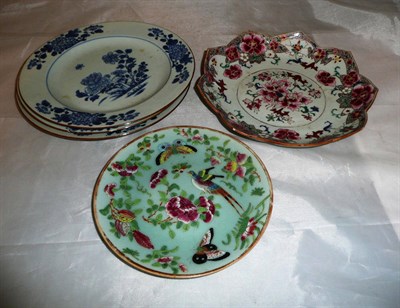 Lot 324 - A Chinese famille rose 'lotus' dish circa 1740, a set of three Chinese blue and white export dinner