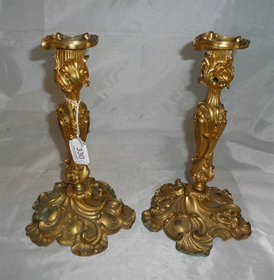 Lot 330 - An ornamental pair of candlesticks