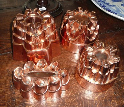 Lot 343 - A group of four copper jelly moulds, English and French, late 19th century, comprising a crown...