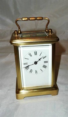 Lot 351 - A brass carriage clock with key