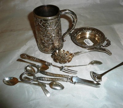 Lot 365 - A white metal mug, silver pierced dish, teaspoons etc