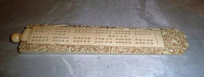 Lot 369 - Late 19th/early 20th century Chinese carved ivory games board with stained ivory markers *