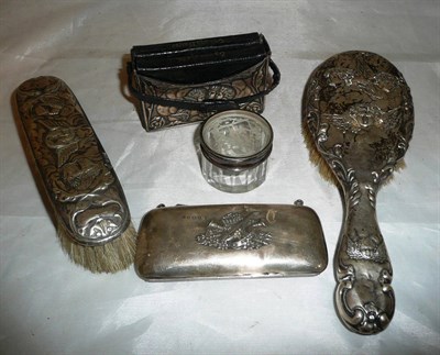 Lot 375 - Two silver backed brushes, silver purse, silver topped toilet jar and two prayer books within a...