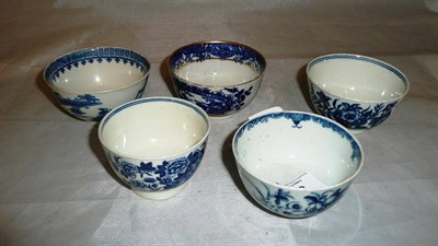 Lot 379 - Four Worcester blue and white tea bowls, one with a pseudo Chinese mark, and another blue and white