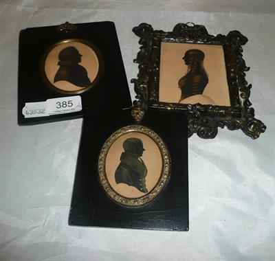 Lot 385 - 19th century three quarter-length portrait miniature silhouette of a lady contained within an...