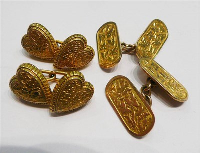 Lot 400 - A pair of 9ct gold engraved cufflinks and a pair of heart shaped cufflinks