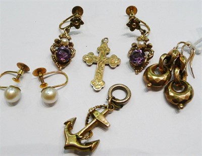 Lot 404 - Three pairs of earrings, a cross charm and an anchor charm