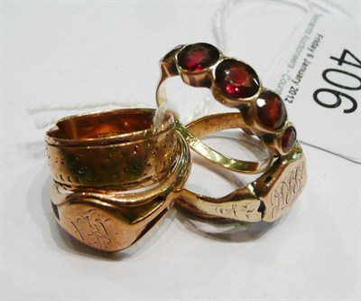 Lot 406 - A 9ct gold band ring (snapped), a 9ct gold signet ring, two signet rings and a garnet five...