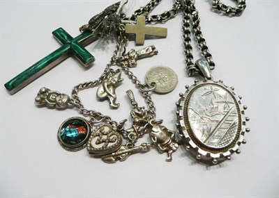 Lot 408 - A silver charm bracelet, a malachite cross, a marcasite peacock brooch and an engraved locket...