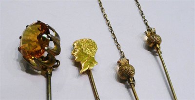 Lot 411 - Three stick pins (including a 'double')  #