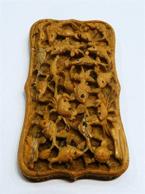 Lot 415 - A Chinese carved ivory card case decorated with swimming fish