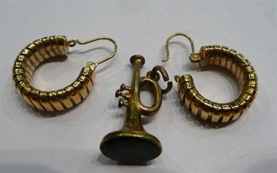 Lot 418 - A pair of 9ct gold hoop earrings and a bloodstone set trumpet fob