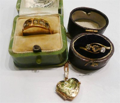 Lot 426 - A 18ct gold and diamond ring (a.f.) (central diamond missing), 15ct gold ring and a locket...