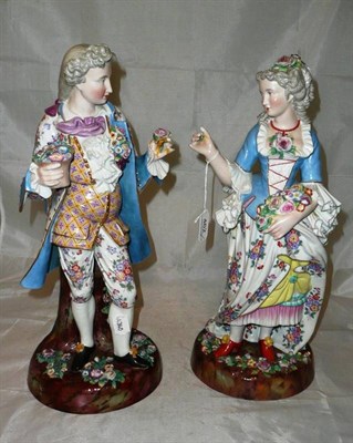 Lot 462 - Pair of Continental lamp base stands, one modelled as a damsel the other modelled as a swain in...