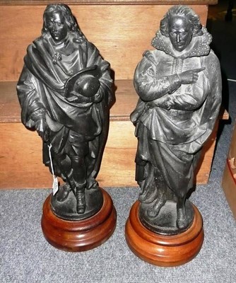 Lot 463 - A pair of 19th century costumed metal figures on turned wooden bases