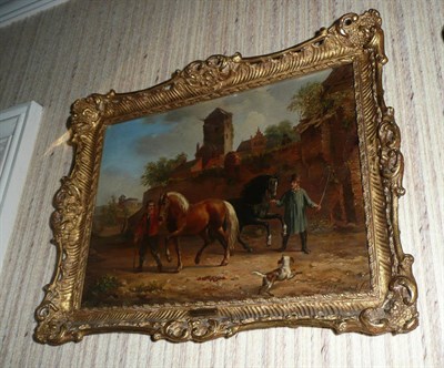 Lot 485 - Jacob Akkersdijk (1815-1862) Dutch, two figures with horses and a dog, with buildings nearby,...